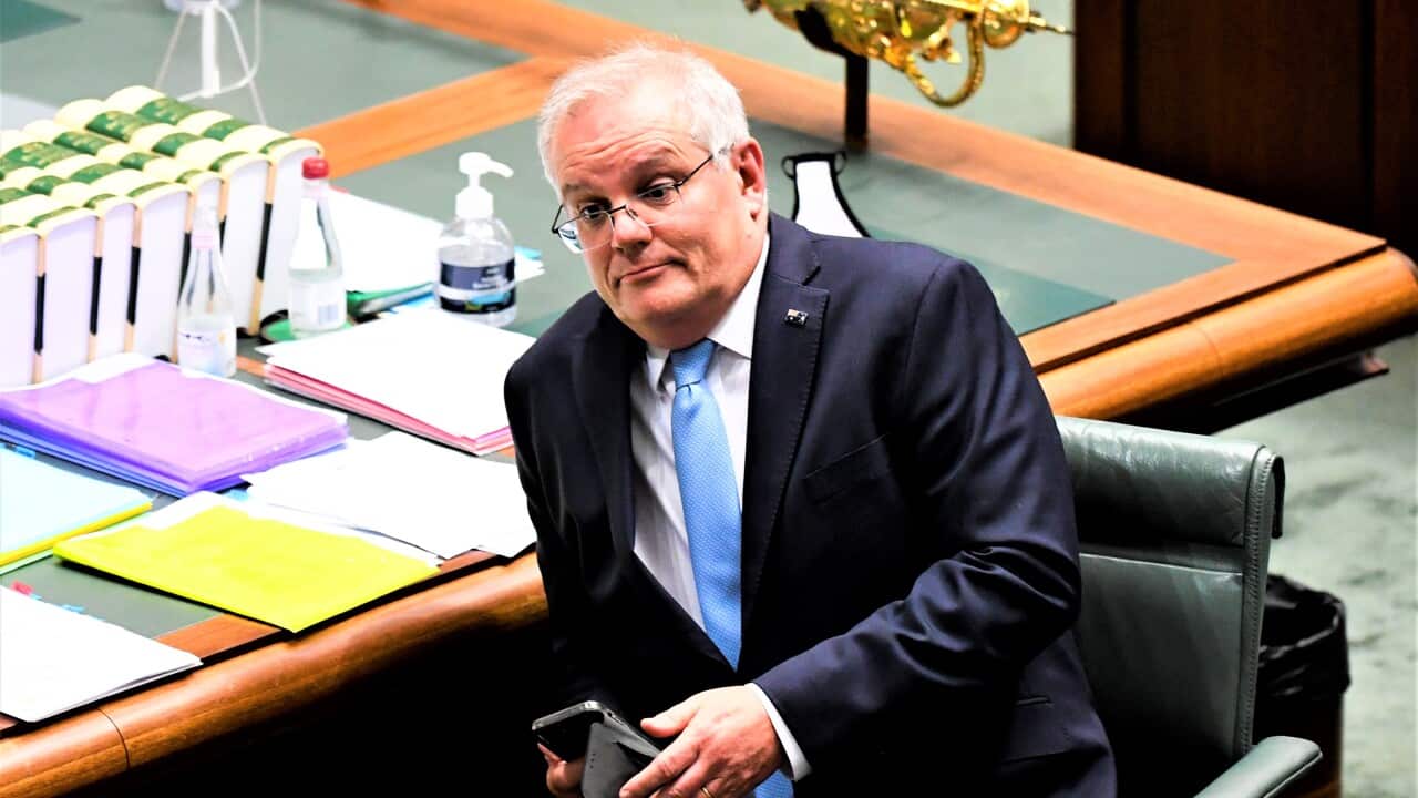 Australian Prime Minister Scott Morrison reacts during House of Representatives Question Time at Parliament House in Canberra, Thursday, December 2, 2021. (AAP Image/Lukas Coch) NO ARCHIVING