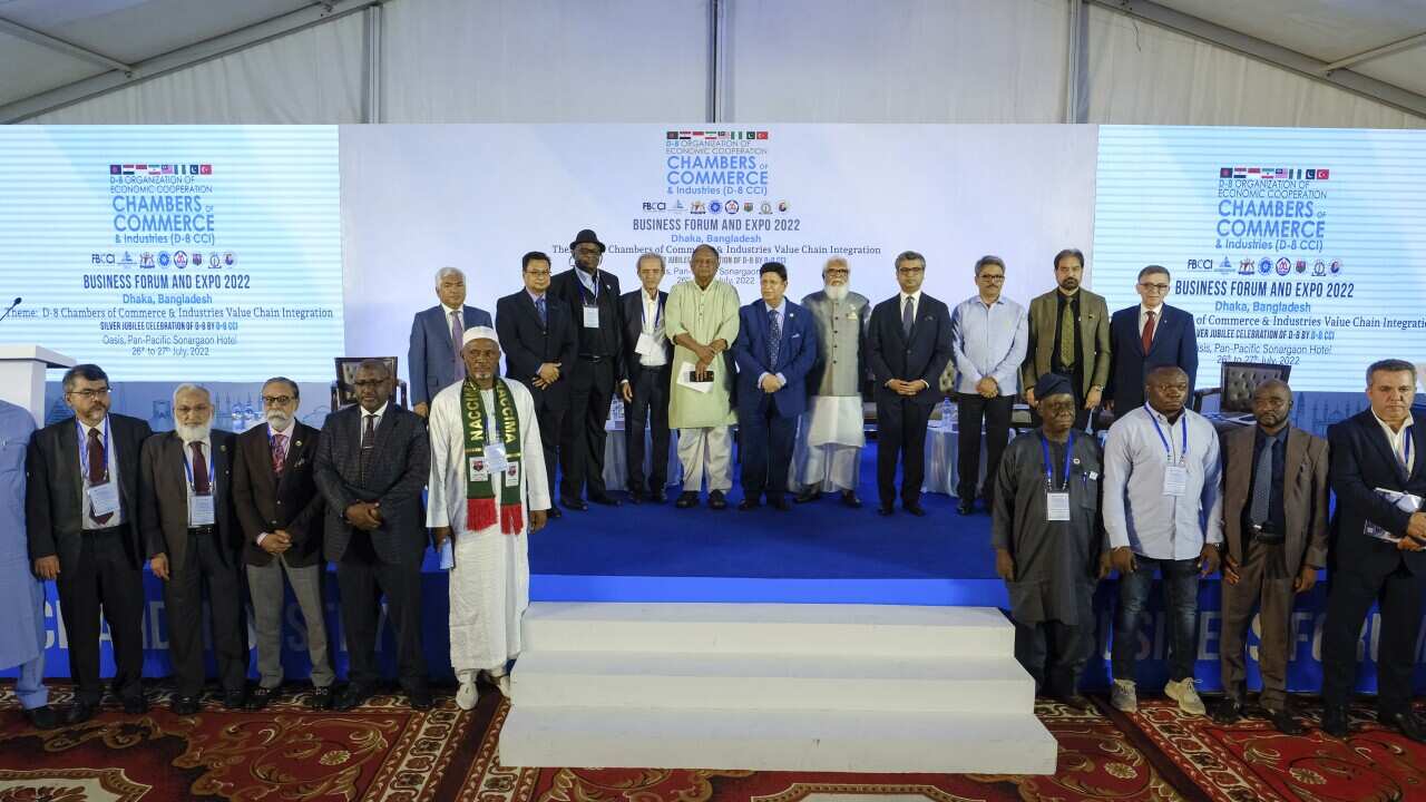 Business leaders and officials from eight developing nations stand for a photograph during the D-8 Chambers of Commerce and Industry Business Forum in Dhaka, Bangladesh