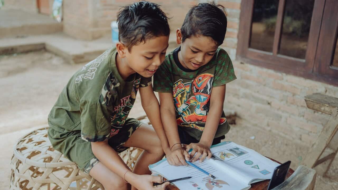 The Yuliani boys are learning at home