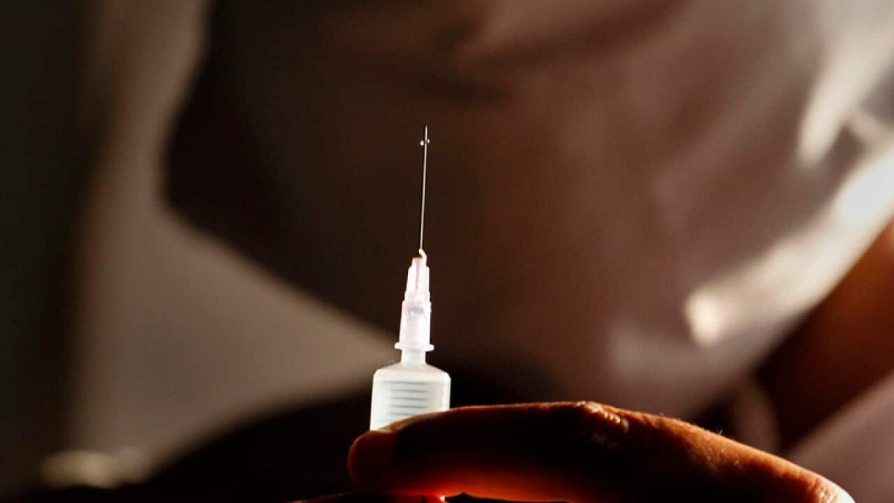 A nurse prepares an injection to administer to a tuberculosis patient. A US study says about a million children, double the previous estimate, fall ill with TB every year. (AAP)