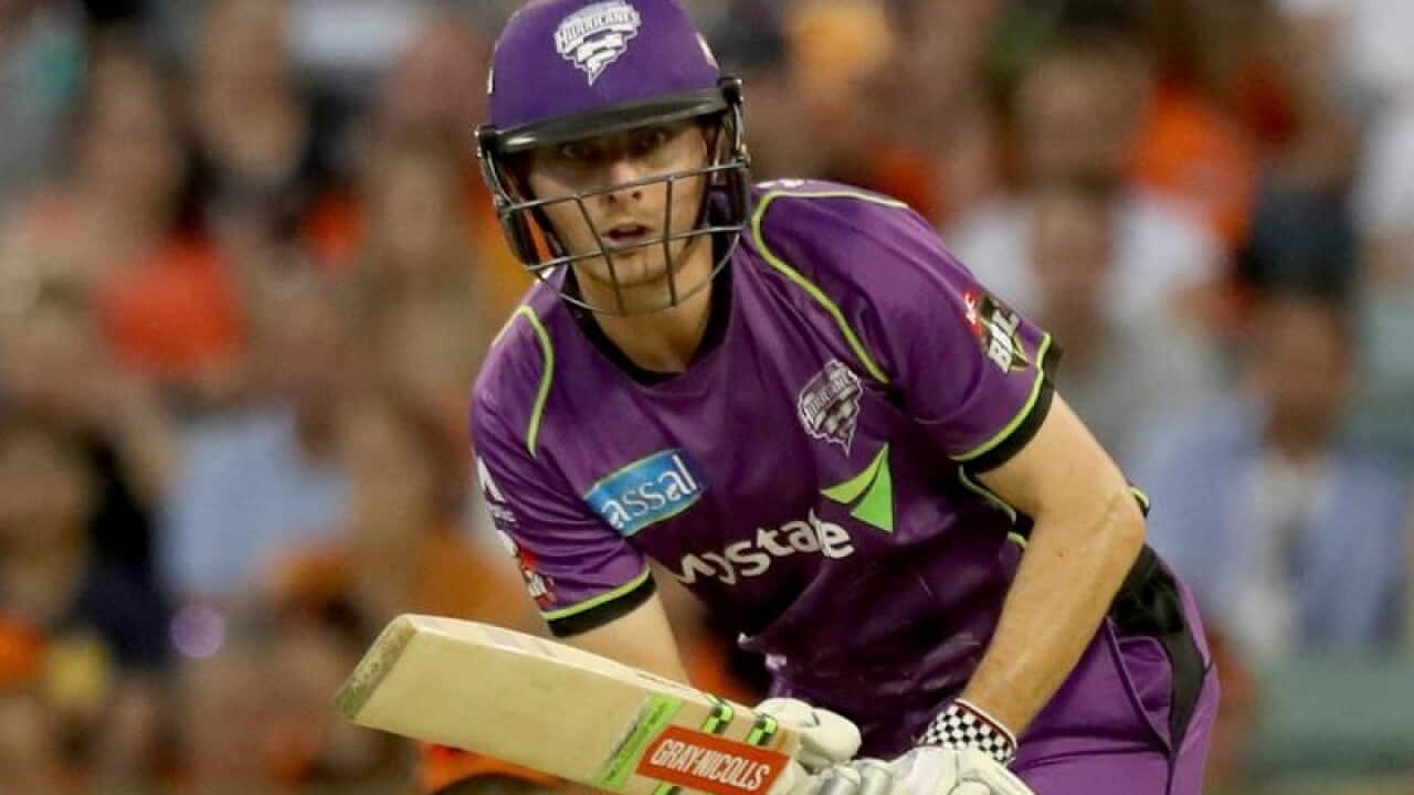 Simon Milenko of the Hurricanes plays a shot