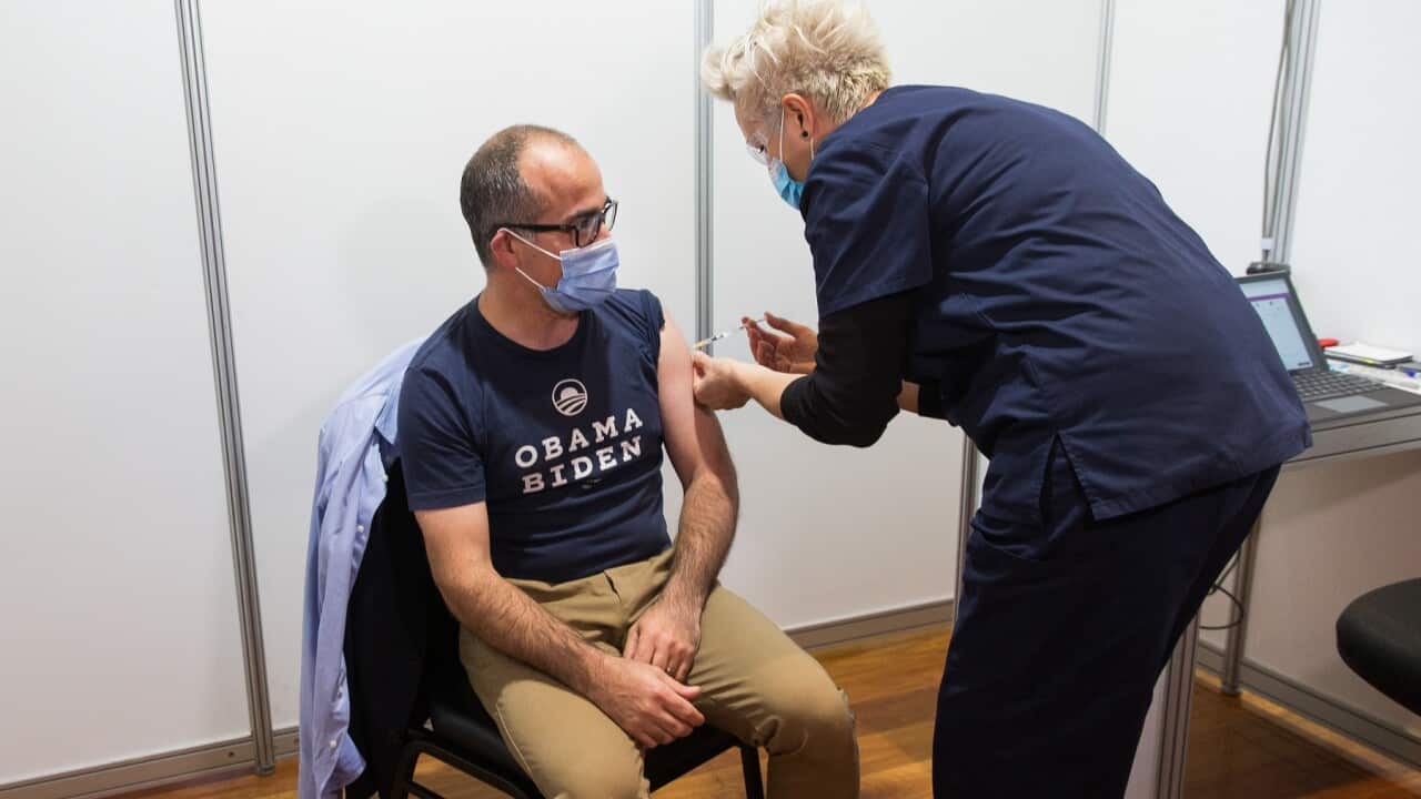 Acting Victorian Premier James Merlino receives a COVID-19 vaccine