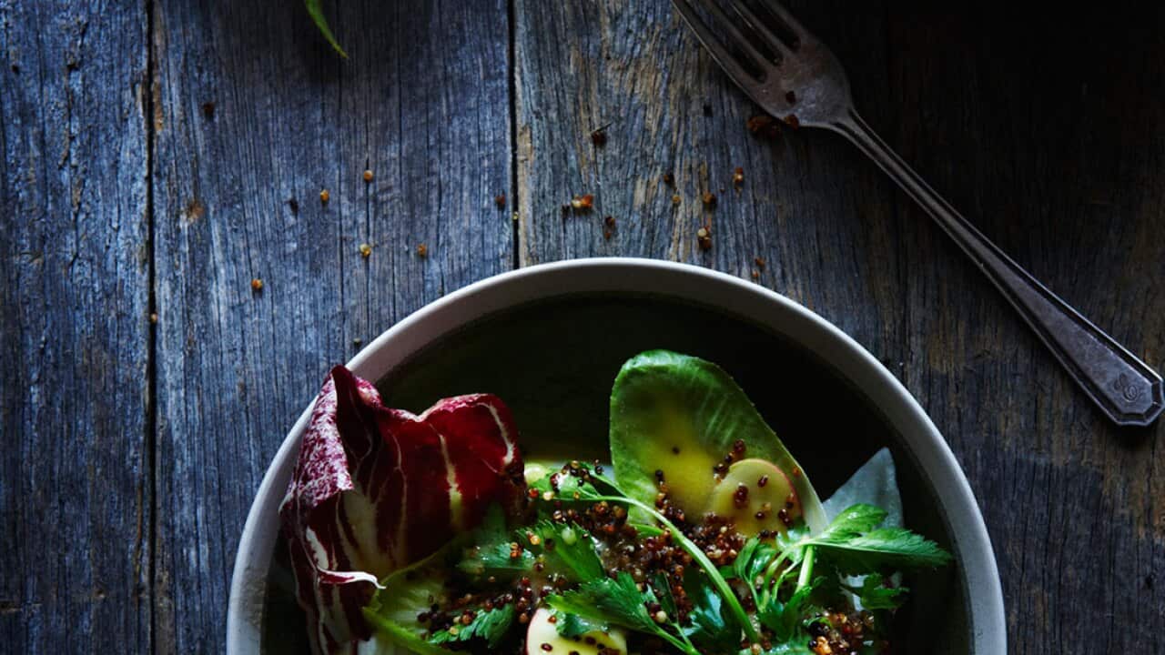 Winter leaf and apple salad with crispy quinoa and cider vinegar Dijon dressing