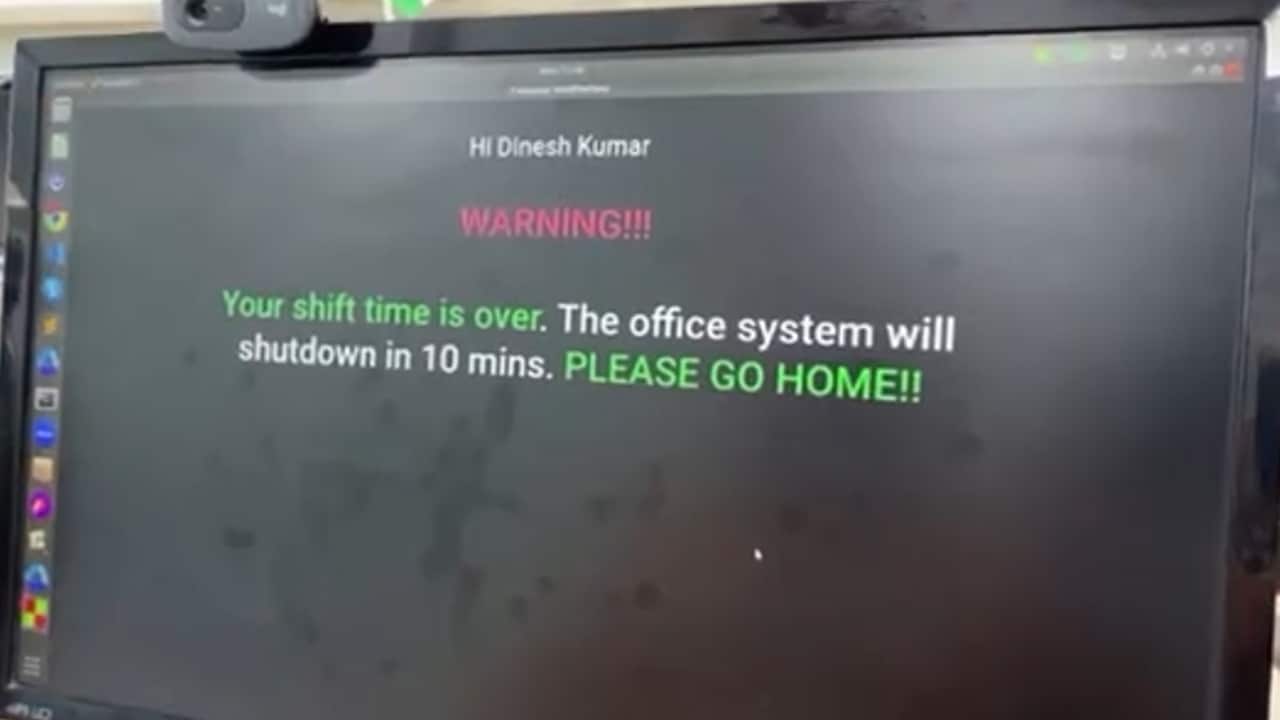 A computer screen with a message that reads: WARNING!!! Your shift time is over. The office system will shutdown in 10 mins. PLEASE GO HOME!!".