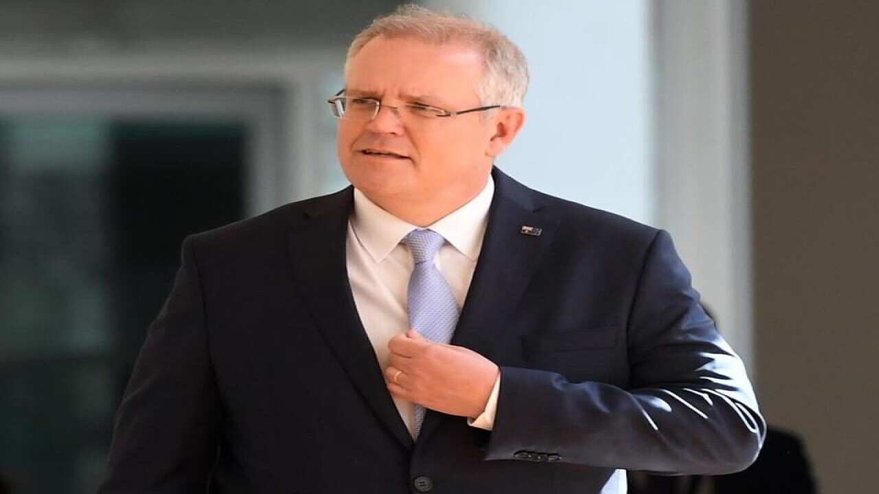 Treasurer Scott Morrison arrives for the Liberal Party room meeting.