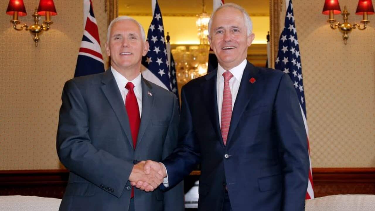 U.S. Vice President Mike Pence, left, shakes hands with Australia's Prime Minister Malcolm Turnbull at Admiralty House in Sydney, Saturday, April 22, 201