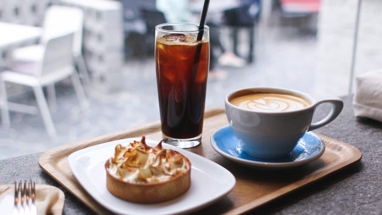 Close-Up Of Coffee And Breakfast Served On Table In Restaurant