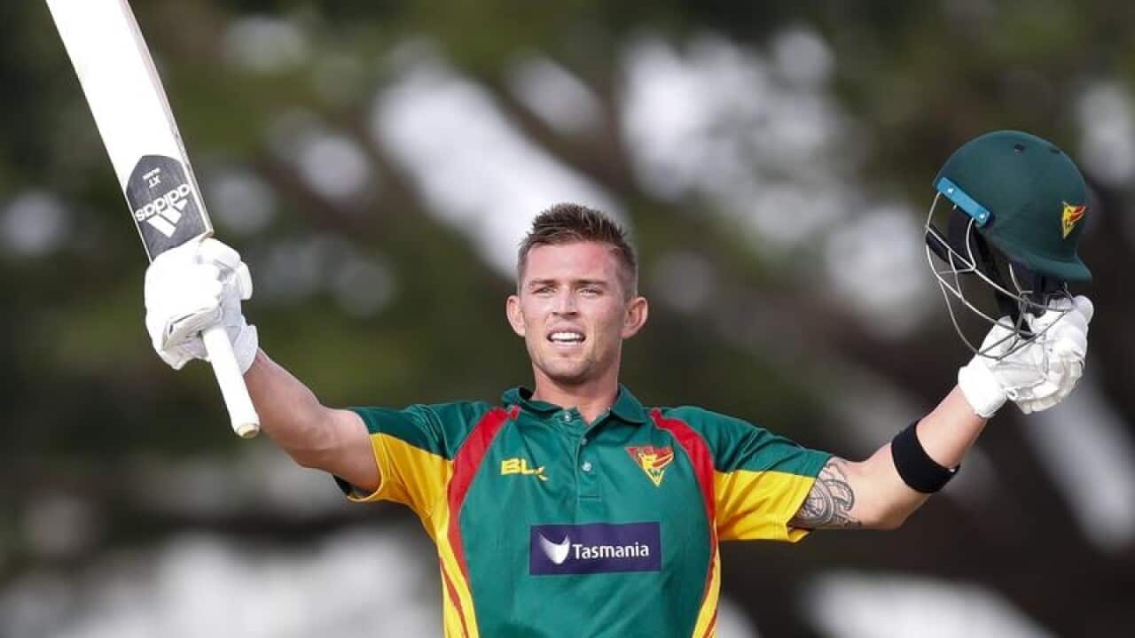 Tasmanian batsman Ben McDermott celebrates his century