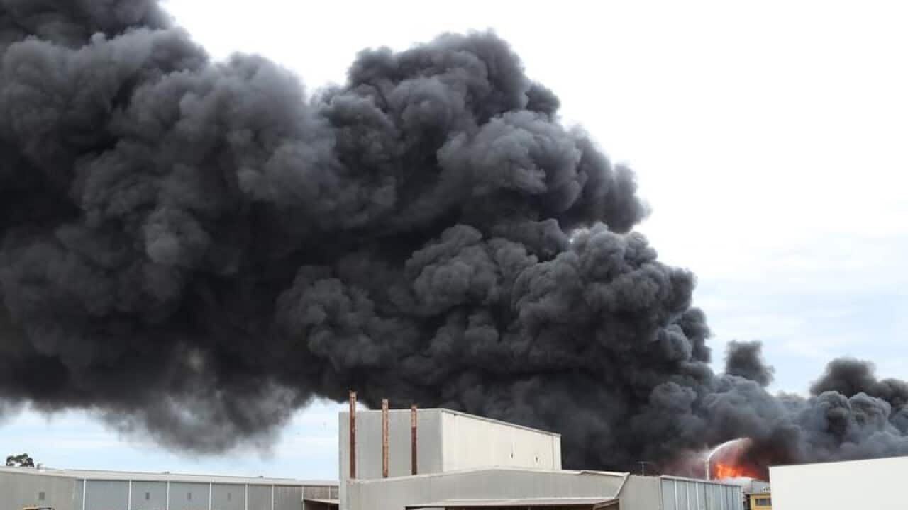 Fire crews battle to control a blaze.