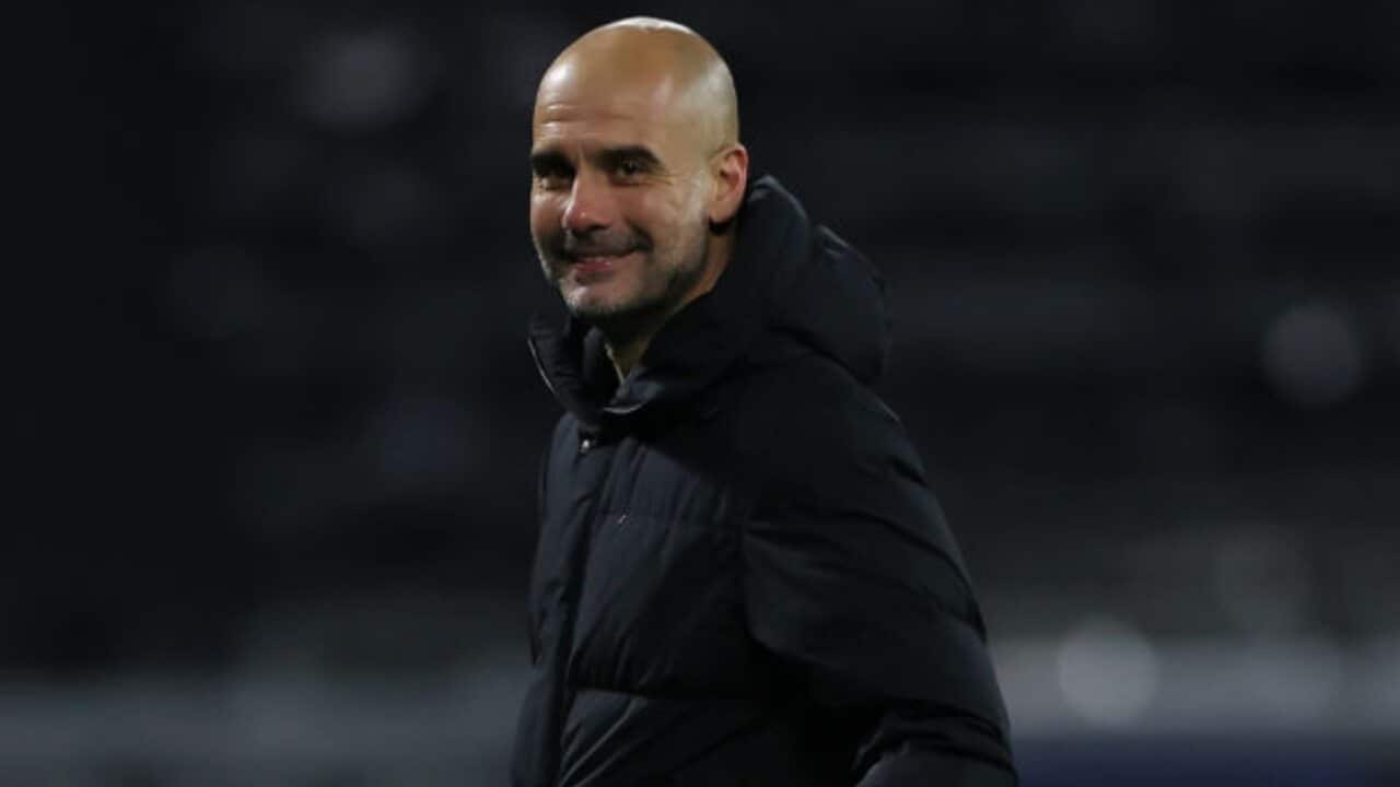 Pep Guardiola reacts during a Manchester City match