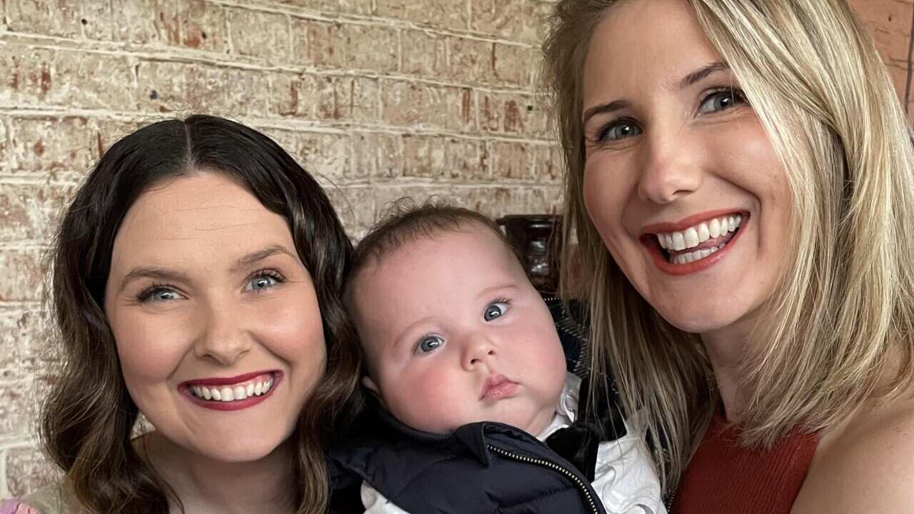 Two women and a baby