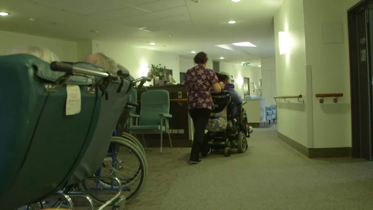 A worker in aged care (SBS).