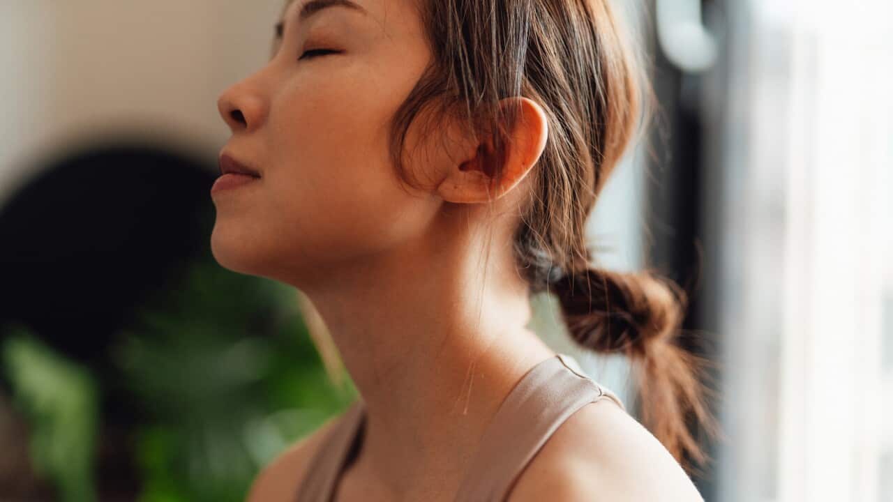 Young woman meditating - Metta meditation - Great Minds