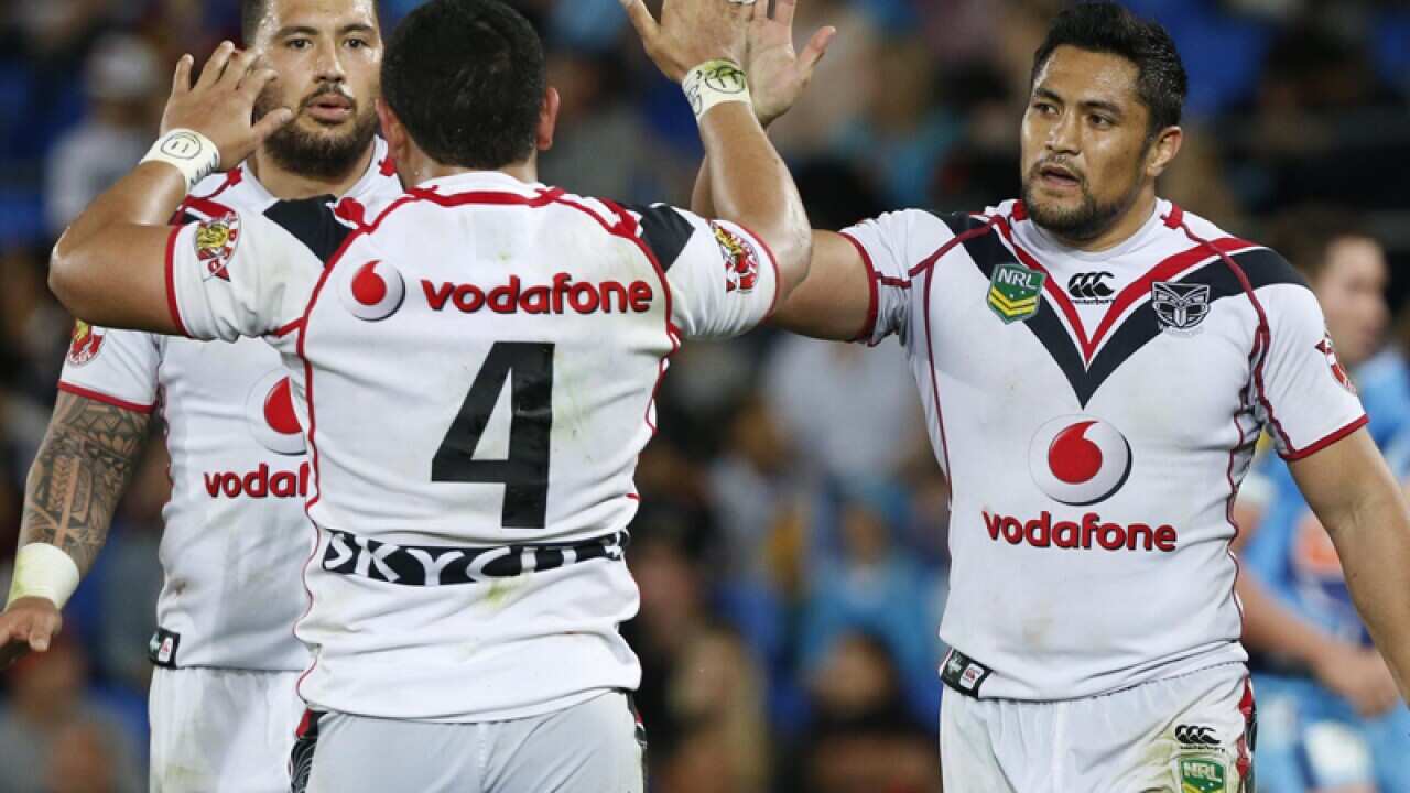 New Zealand Warriors' Jerome Ropati (C) celebrates his try