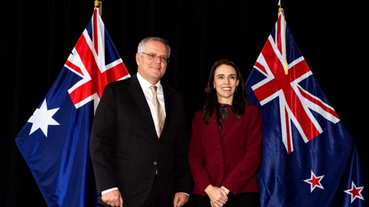 New Zealand Prime Minister Jacinda Ardern (R) poses for a photo with Australian Prime Minister Scott Morrison.