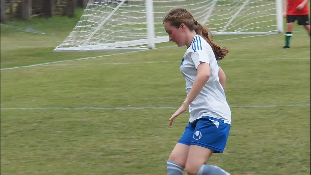 Megan Butner in her football-playing days (Supplied).jpg