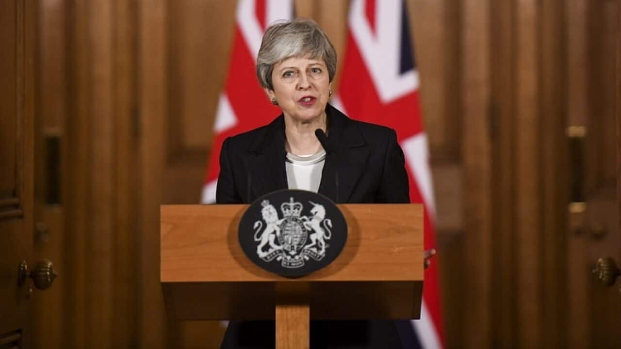 British Prime Minister Theresa May makes a statement inside number 10 Downing Street in London.