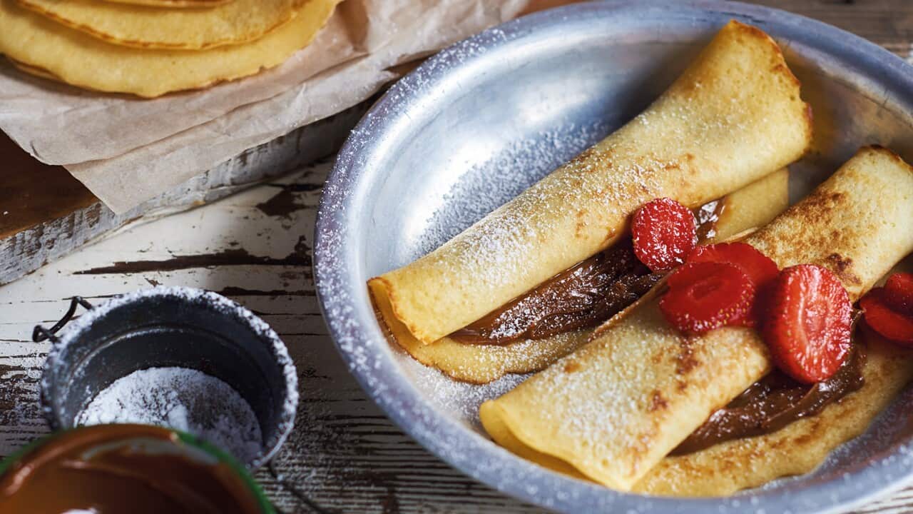 Pancakes with dulce de leche and strawberries