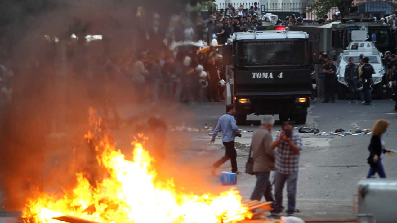 A fire is seen in a street of Ankara