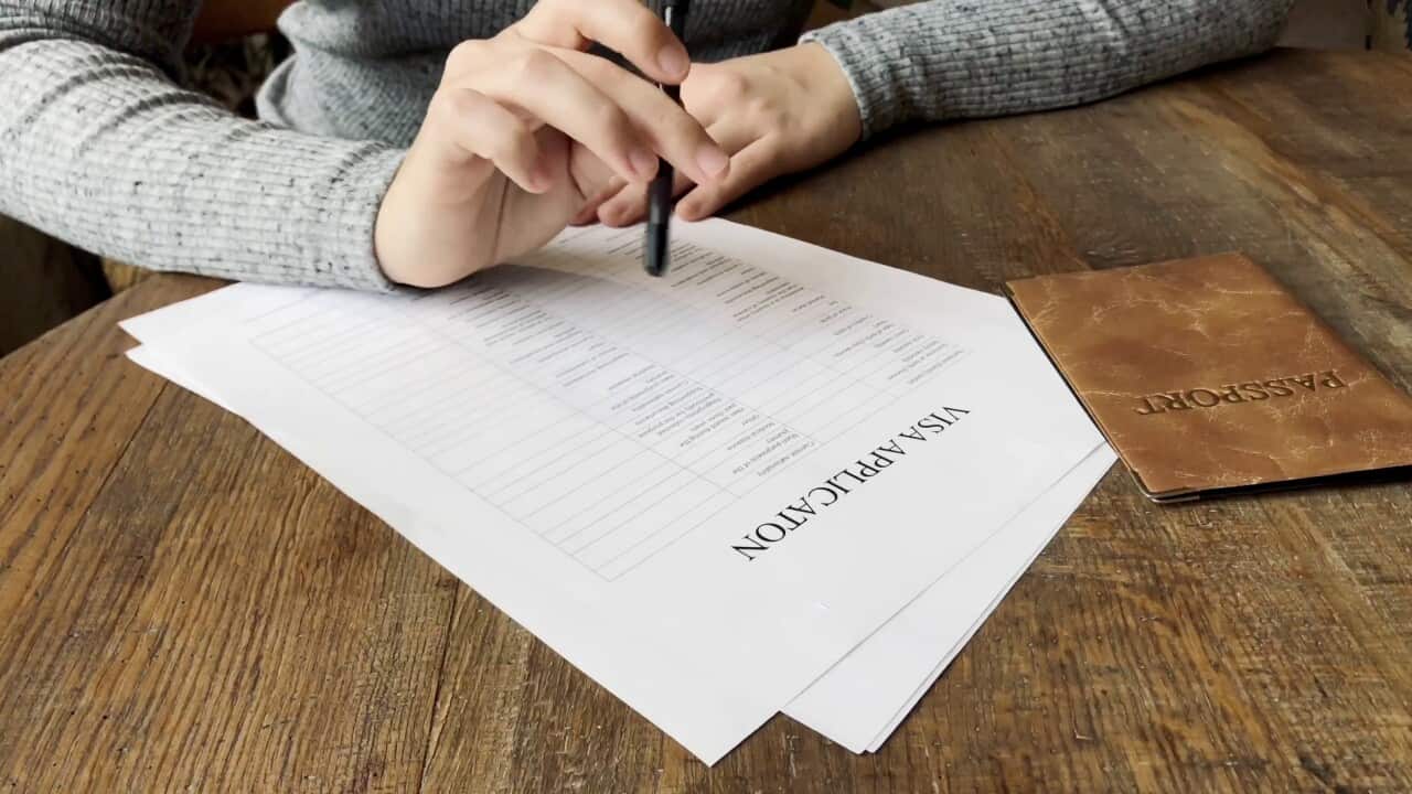 visa-application-form-immigration-concept-SBI-349428979.jpg