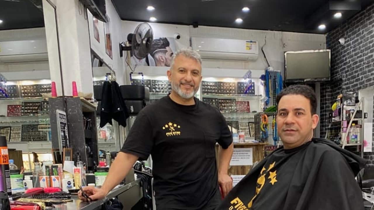 الحلاق حسن عبد علي - سيدني.png