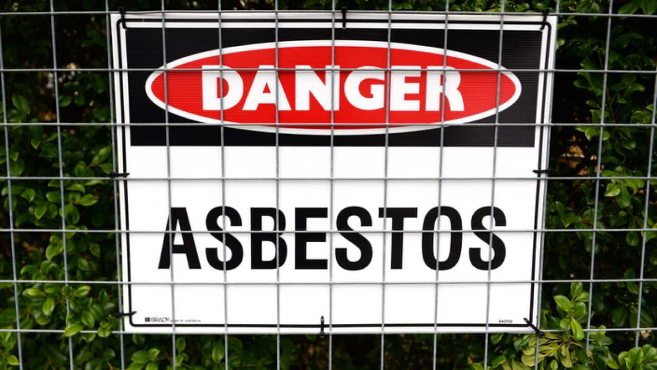 A stock image of an asbestos warning sign