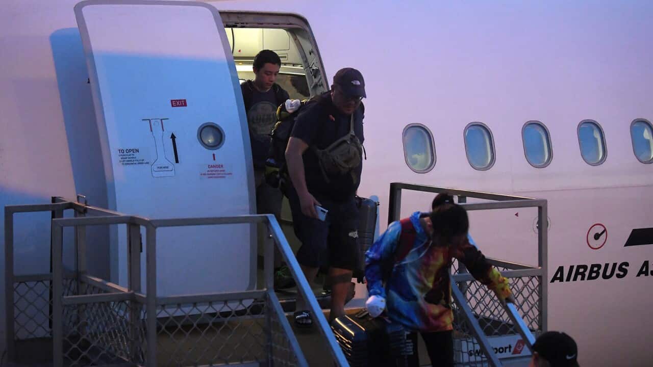 Australian evacuees who were quarantined on Christmas Island arrive at Sydney Airport