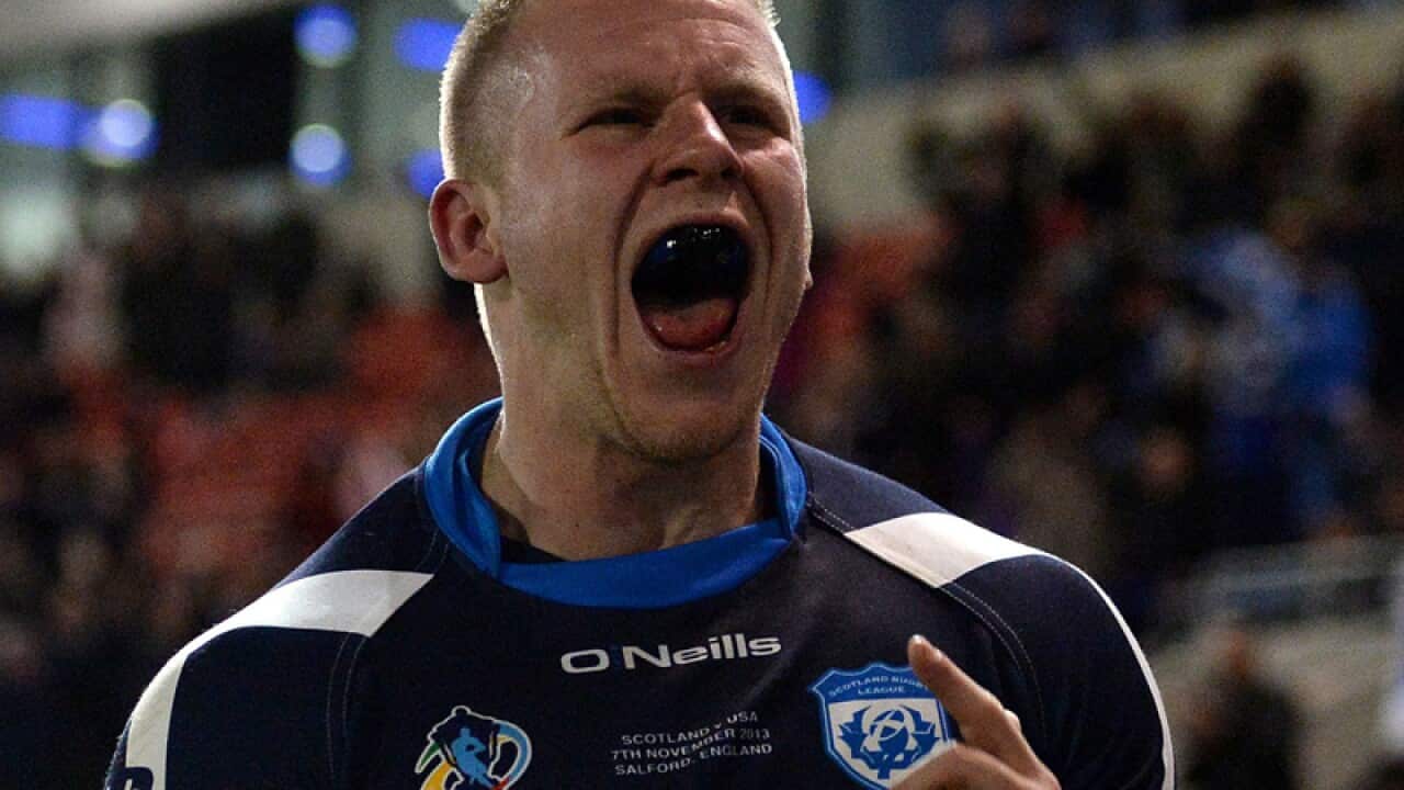 Scotland's Alex Hurst celebrates his try against USA.