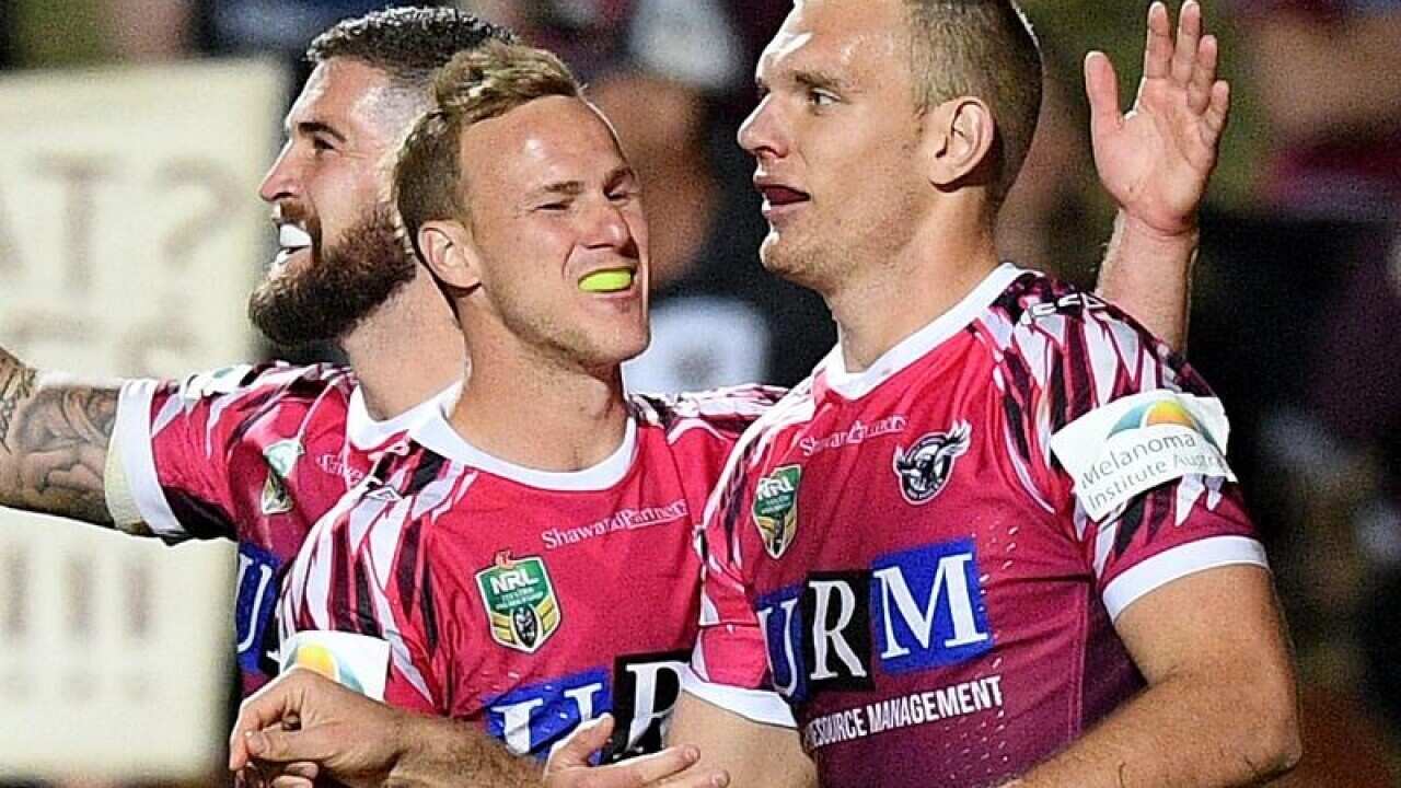 Daly Cherry-Evans and Tom Trbojevic of Manly