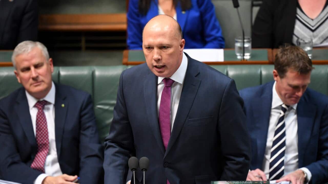 Australian Home Affairs Minister Peter Dutton speaks during House of Representatives Question Time at Parliament House in Canberra, Wednesday, 24 July, 2019. (AAP Image/Lukas Coch)