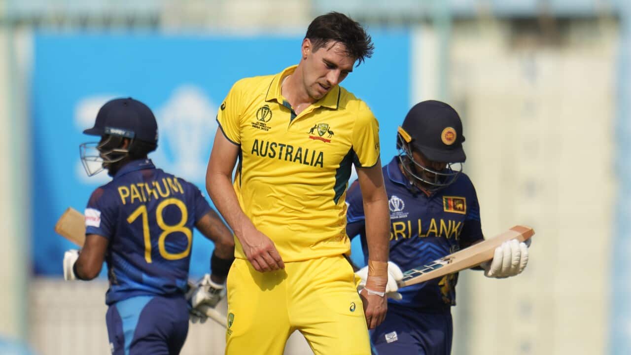 Australia's captain Pat Cummins reacts after a boundary on his delivery during the ICC Men's Cricket World Cup match between Australia and Sri Lanka in Lucknow, India on Monday, 16 October 2023.