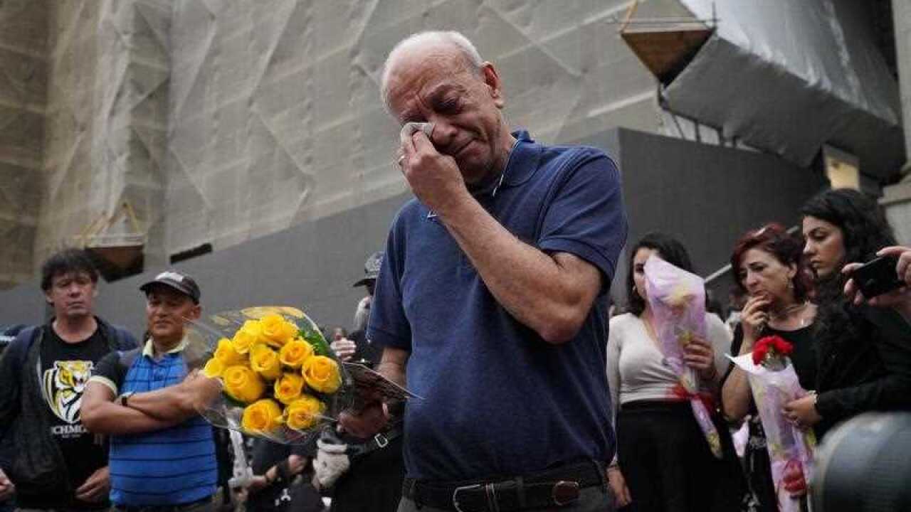 Aiia Maasarwe's father Saeed Maasarwe at the vigil for his daughter on the steps of Parliament House, Melbourne.