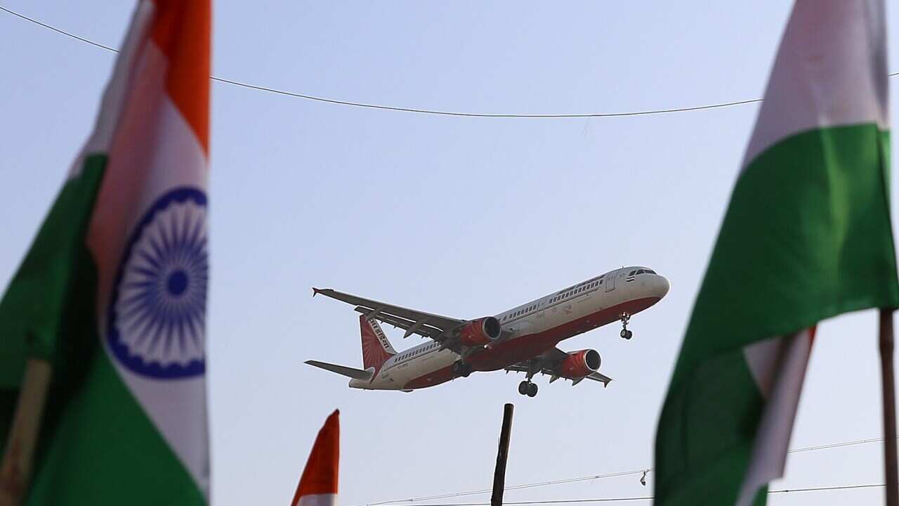 More than 70 passengers barred from first repatriation flight from India after 40 test COVID positive.