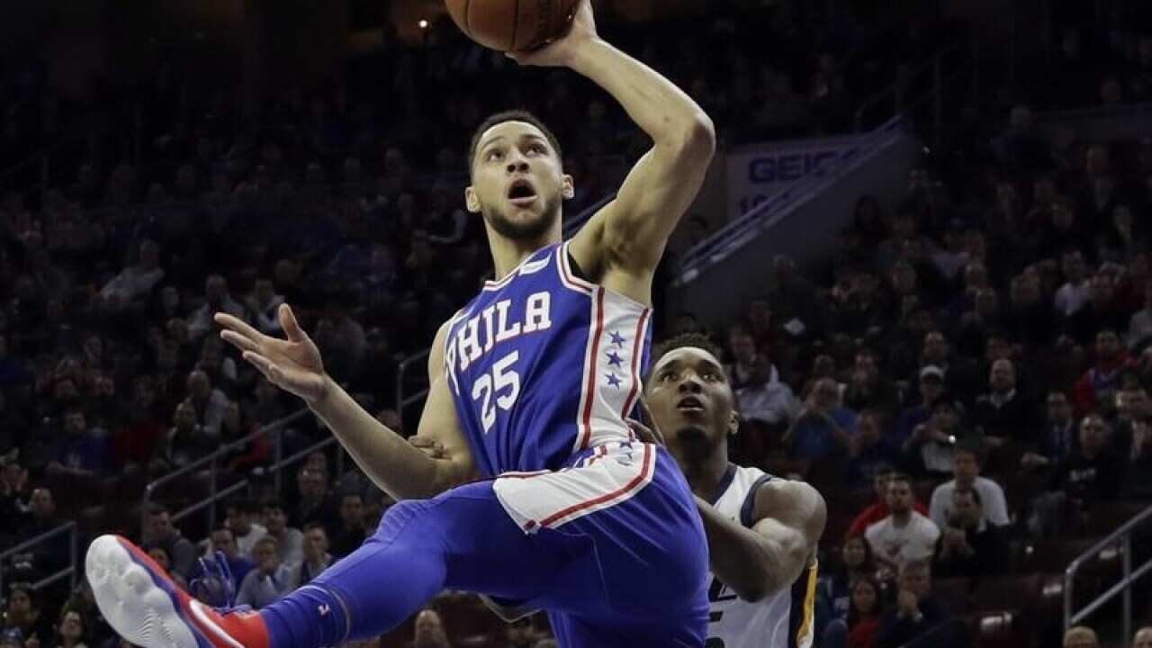 Philadelphia 76ers' Ben Simmons goes up for a shot