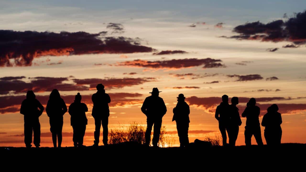 The sun rises over the Simpson Desert in outback Australia.