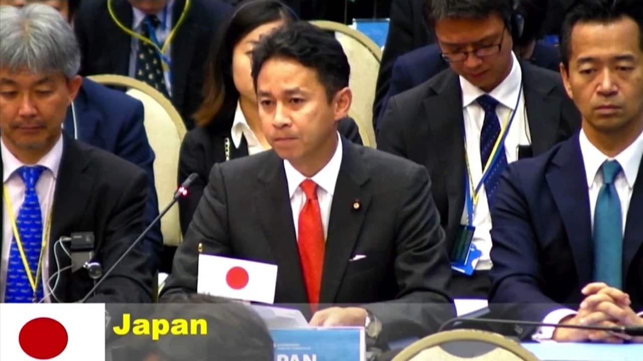 Members of the Japanese delegation at the 67th plenary meeting of the International Whaling Commission (IWC).