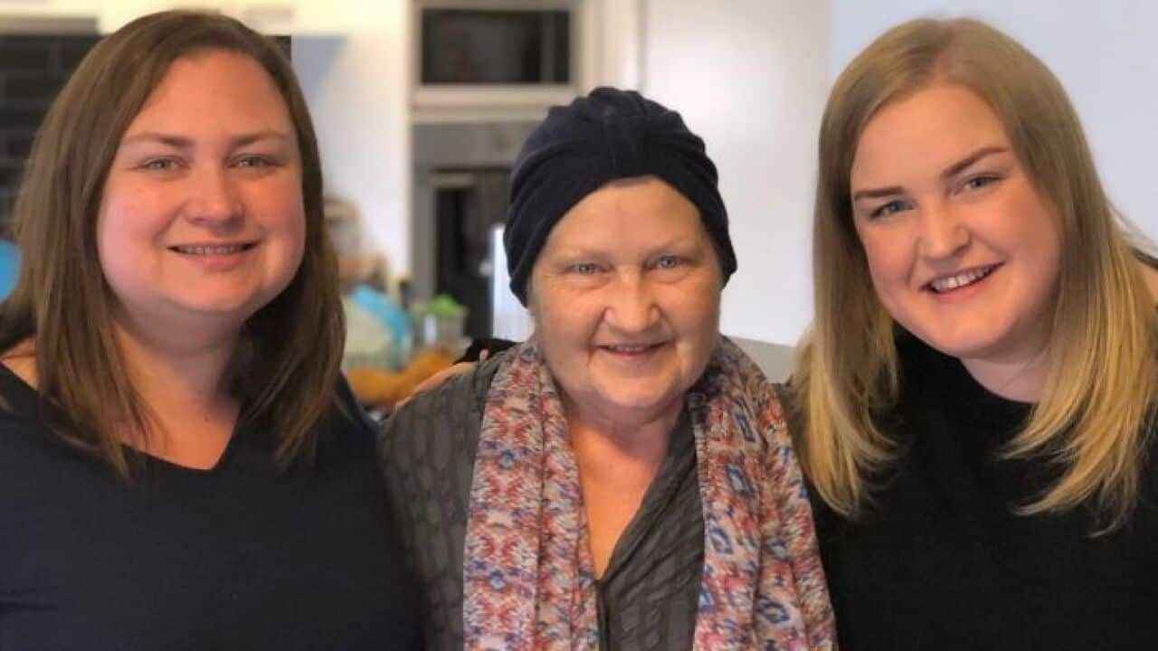Kerry Robertson (centre) with her daughters Jacqui Hicks and Nicole Robertson. Mrs Robertson has become the first Victorian to end her life under the new law.