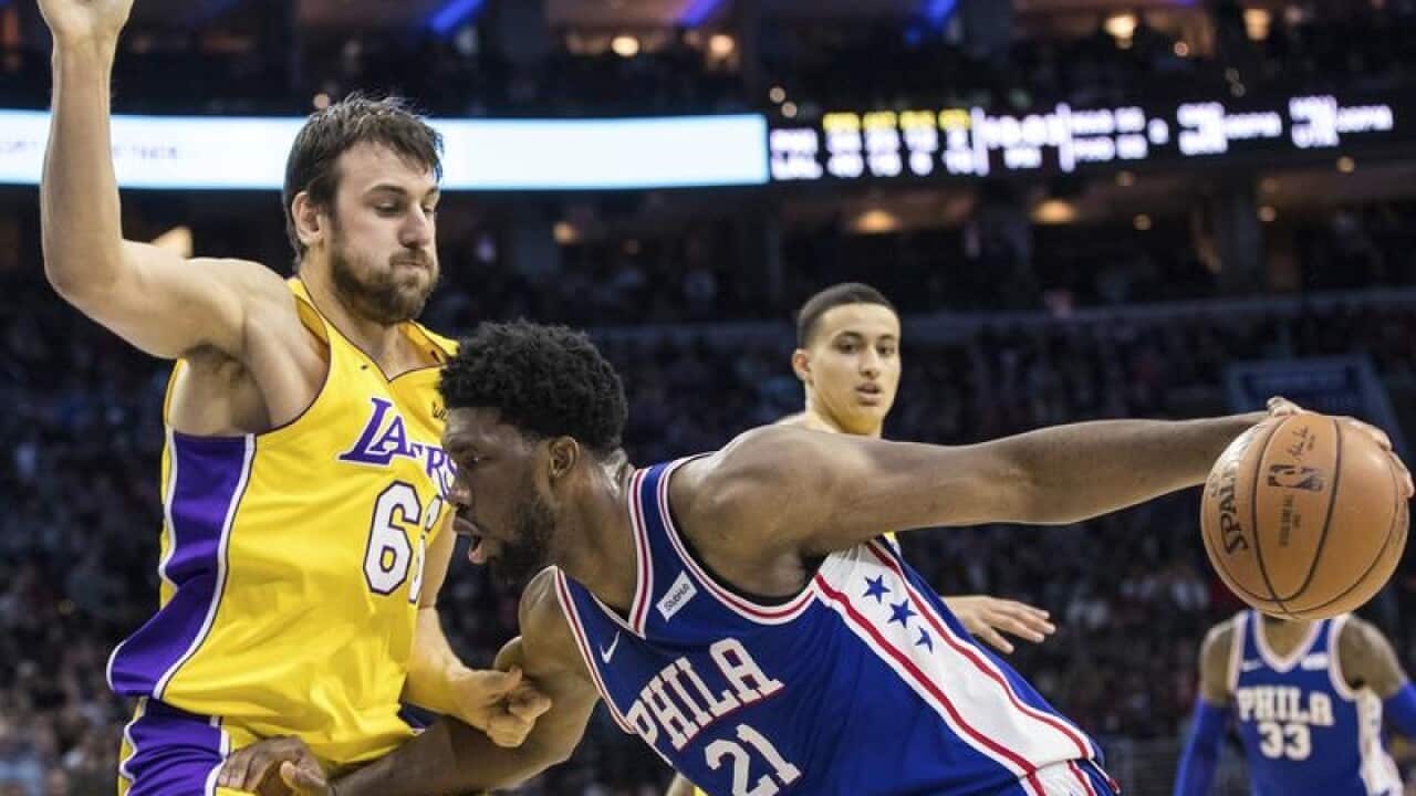 Andrew Bogut and Joel Embiid.