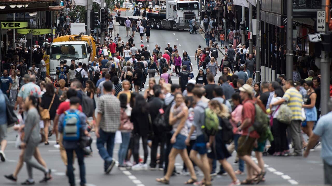 Pedestrians in Sydney CBD (AAP).