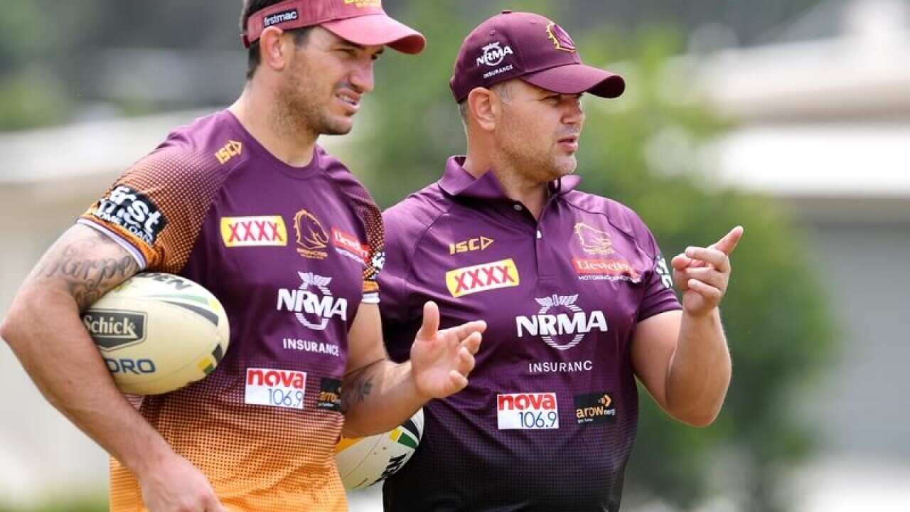Anthony Seibold (right) chats to Matt Gillett (left)
