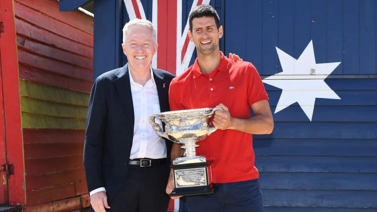 Novak Djokovic poses with Australian Open Tournament Director Craig Tiley on Brighton Beach in Melbourne. Serbia, Tennis, Australian Open