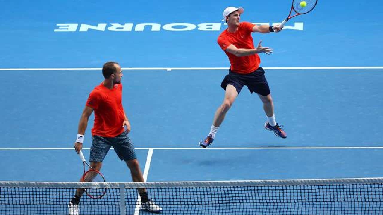 Bruno and Jamie plays a forehand in his/her semi final match against XXXX of ZZZZ during day 11 of the 2016 Australian Open at Melbourne Park on January 28, 2016 in Melbourne, Australia.