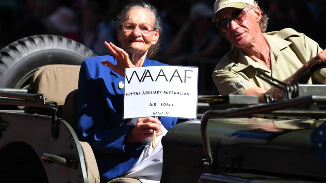 War veteran Jean Curry, 91, takes part in an ANZAC Day march