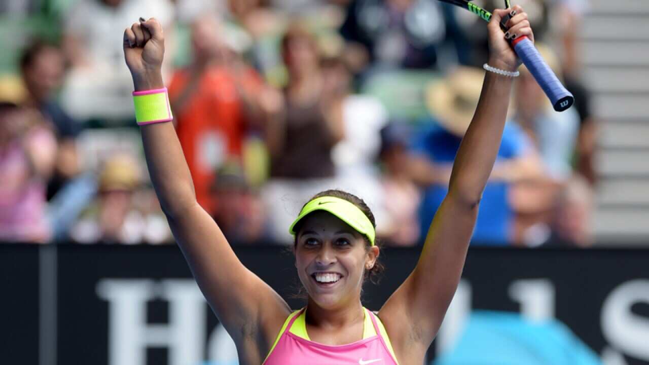 Madison Keys of the USA celebrates her win against Venus Williams