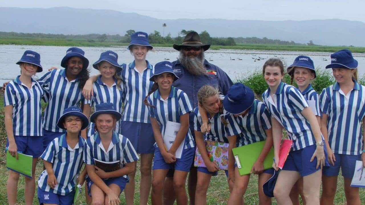 Jacob Cassidy, Mungalla Director facilitates a school excursion at the wetlands