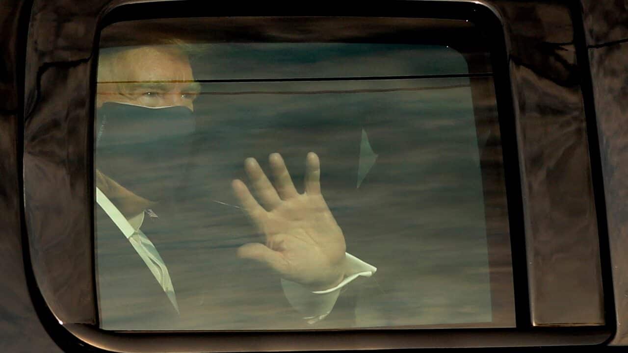 US President Donald Trump in a motorcade outside Walter Reed Medical Center