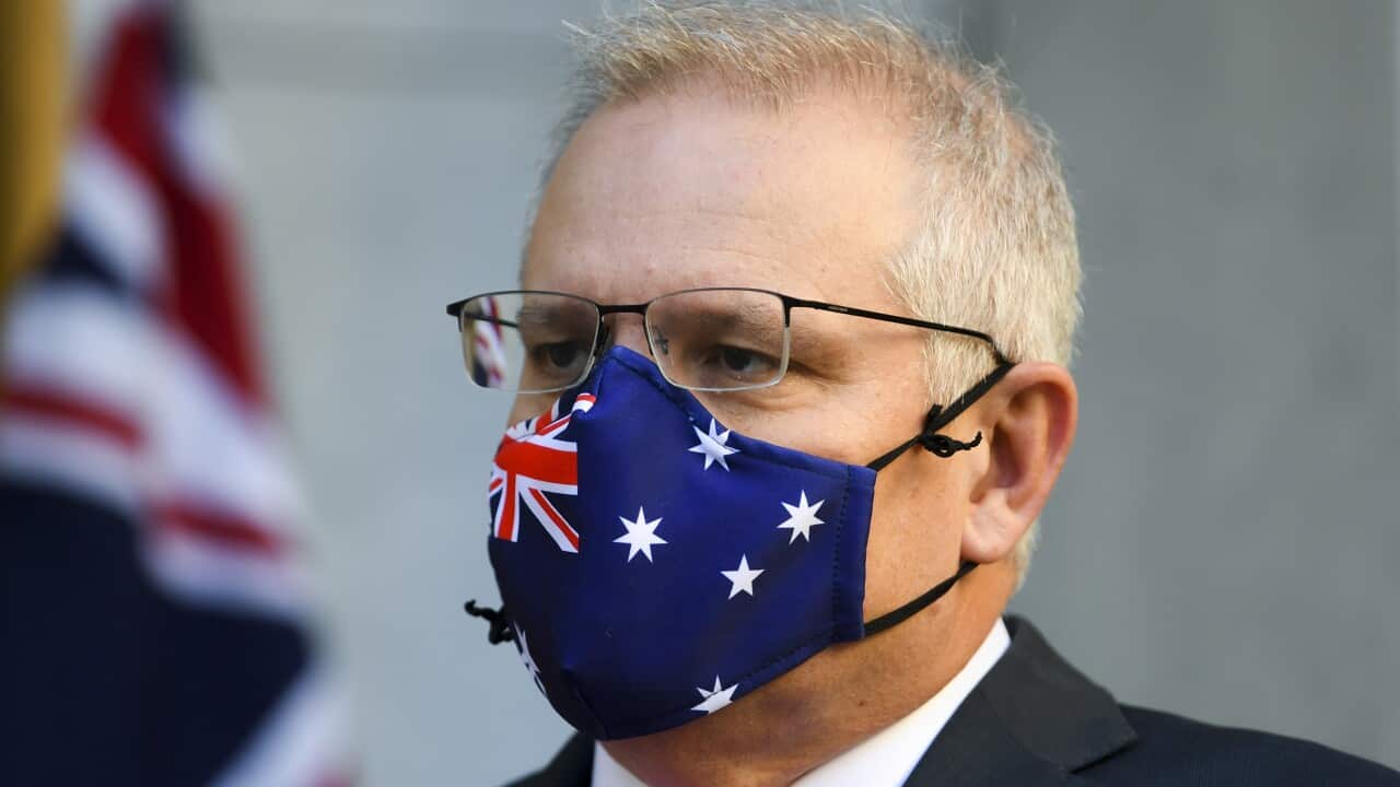 Australian Prime Minister Scott Morrison wears his face mask during a press conference following a national cabinet meeting, at Parliament House in Canberra, Friday, August 13, 2021. (AAP Image/Lukas Coch) NO ARCHIVING