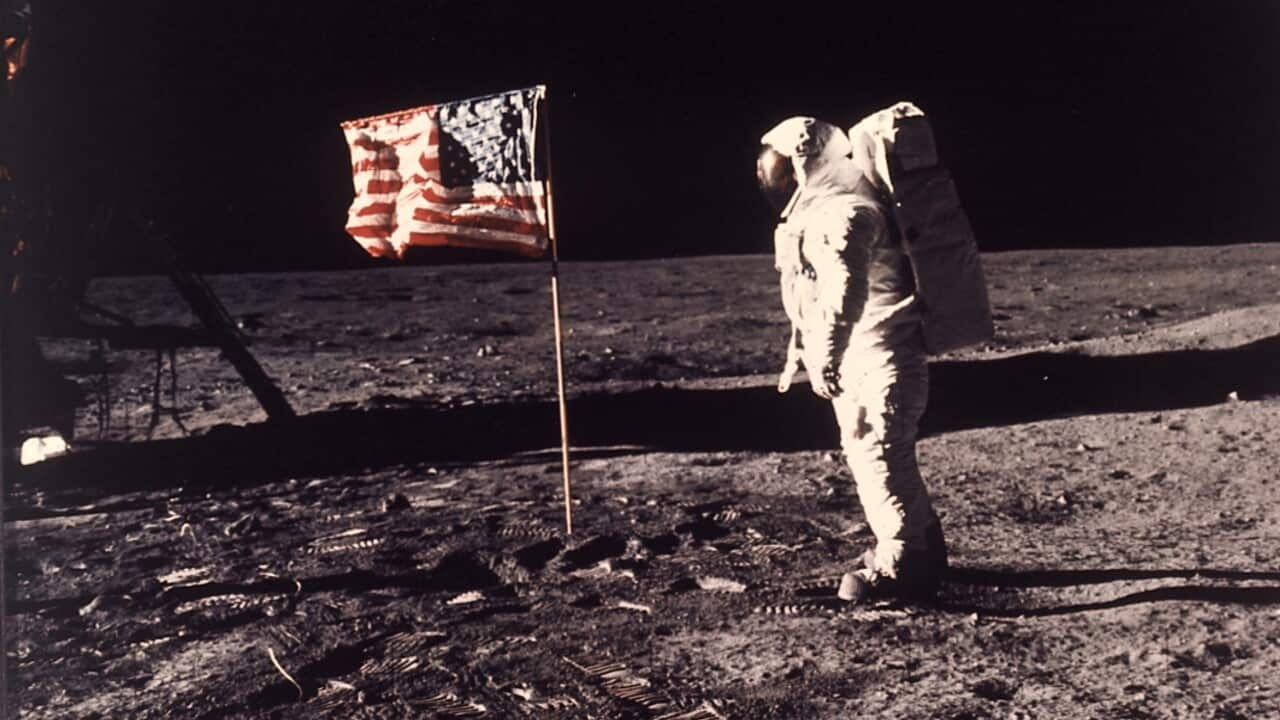 Astronaut Buzz Aldrin poses for a photograph beside the U.S. flag deployed on the moon during the Apollo 11 mission on July 21, 1969.