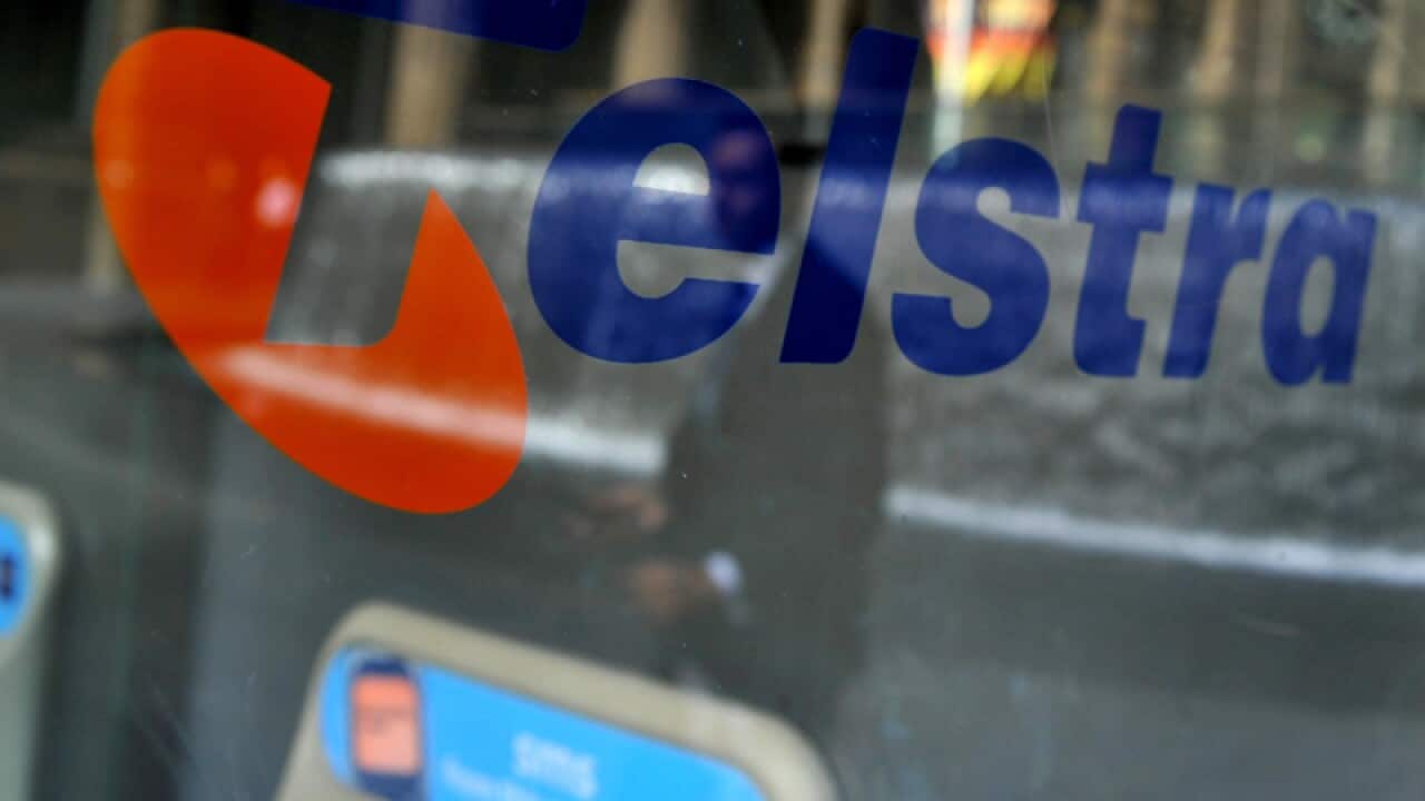 Telstra signage on a public phone booth in Sydney