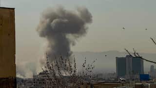 A plume of smoke rises after an attack.